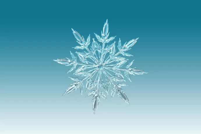 image of a snowflake blue background