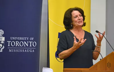 Margaret Trudeau speaking at podium
