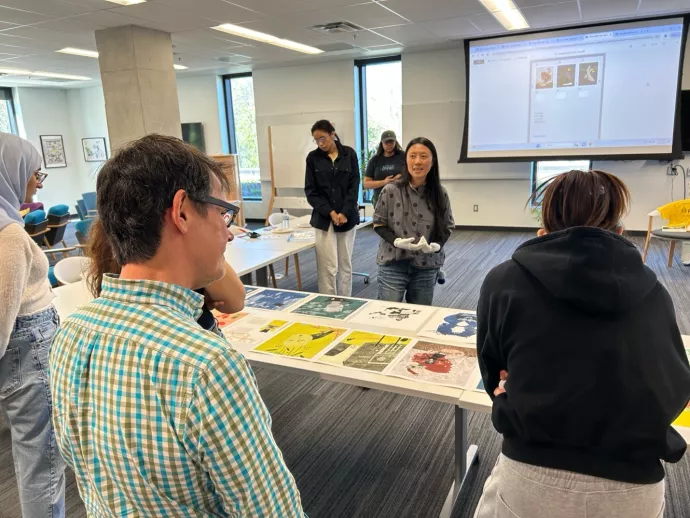 pip o. Art Director, Pei-Yu Chang, speaking about her artistic interpretation of CCDMP research with UTM students, staff, and faculty