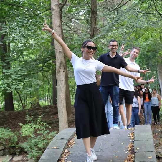 Students happily crossing a bridge