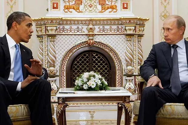 Image of Vladimir Putin speaking with Barrack Obama