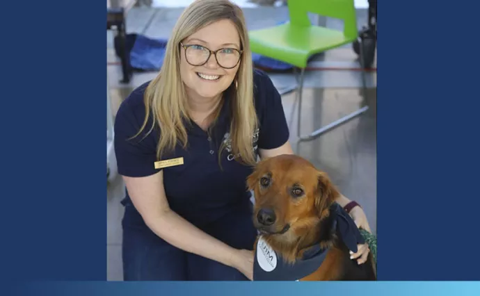 Woman and friendly looking dog