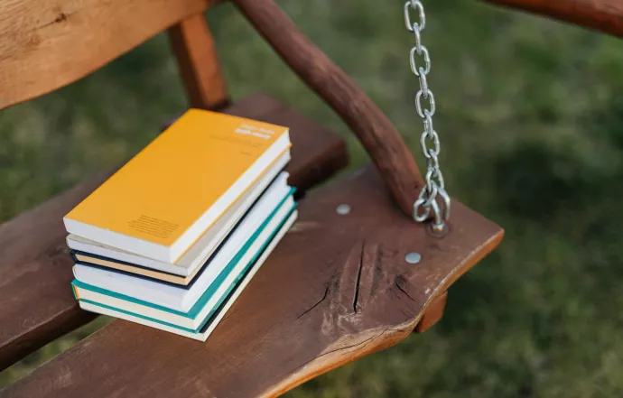 Stack of books on a swing