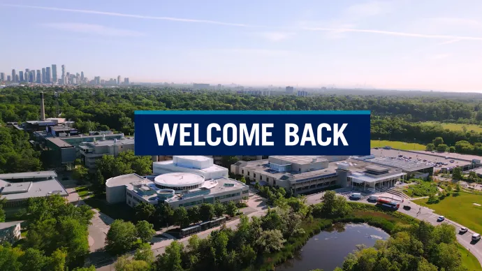 campus scene with the words Welcome Back