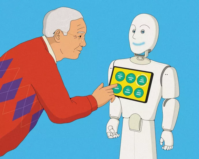 An elderly man pushes buttons on a humanoid robot