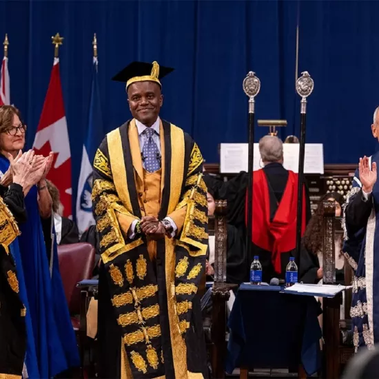 Wes Hall on the stage at Convocation Hall