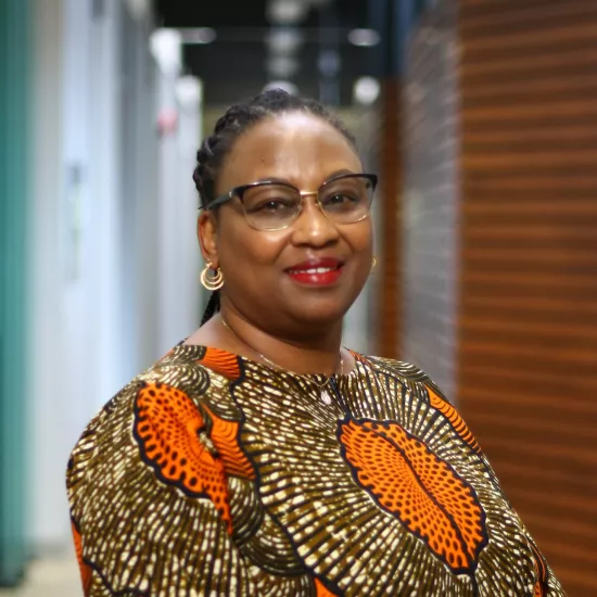 Headshot of Eileen Waweru in UTM hallway